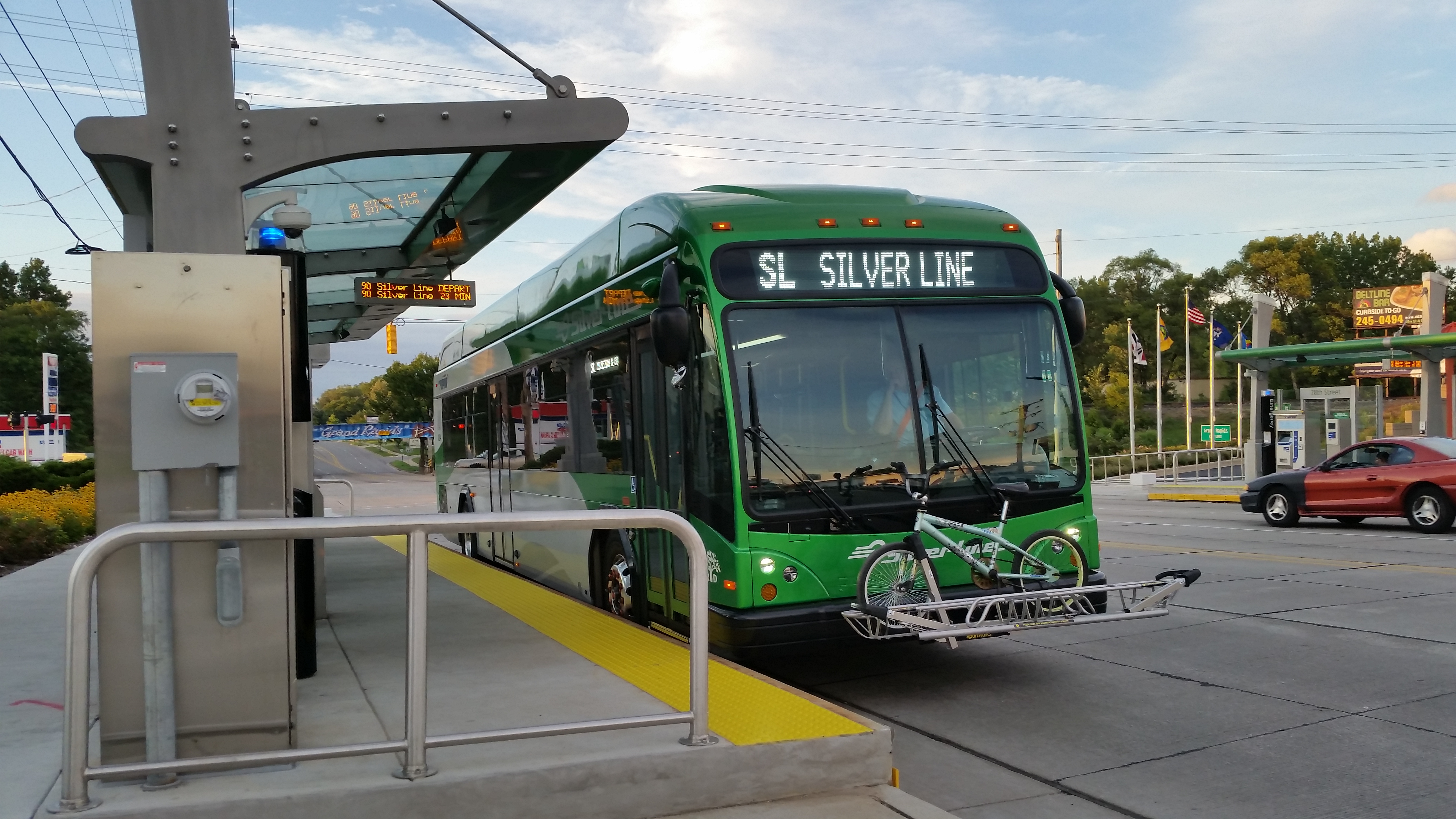The Silver Line departing from a station.