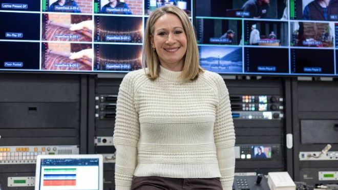 Professor Jessica Harthorn stands in the control room at Calvin University.