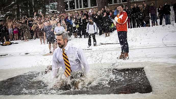 President Le Roy takes the Cold Knight Plunge with fellow students.